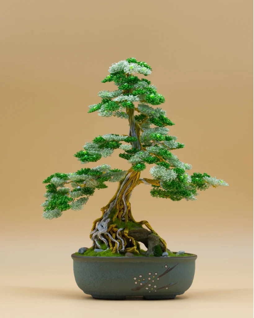Bonsaï artisanal en fil de fer « Soupir de Jade », feuillage vert et vert pâle perlé, racines dorées sur un rocher, H 38 × L 30 cm
